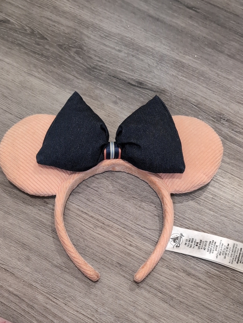 Disney Peach Minnie Ear Headband with Black Bow Accent